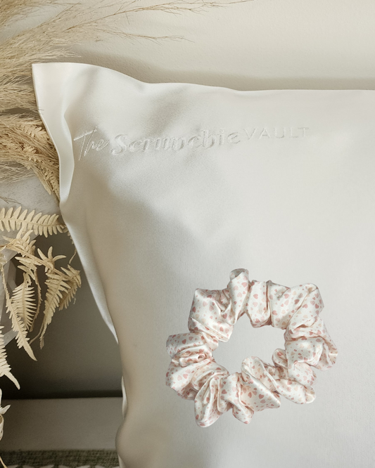 24/7 Shine Set – 22 momme Mulberry Silk pillowcase and printed Classic Silk scrunchie shown together, styled for smooth sleep and effortless daytime hair care.
