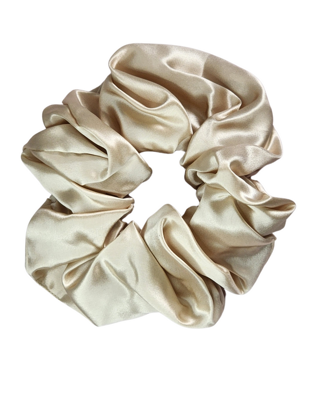 Oat Milk oversized mulberry silk scrunchie in beige cream on a white background